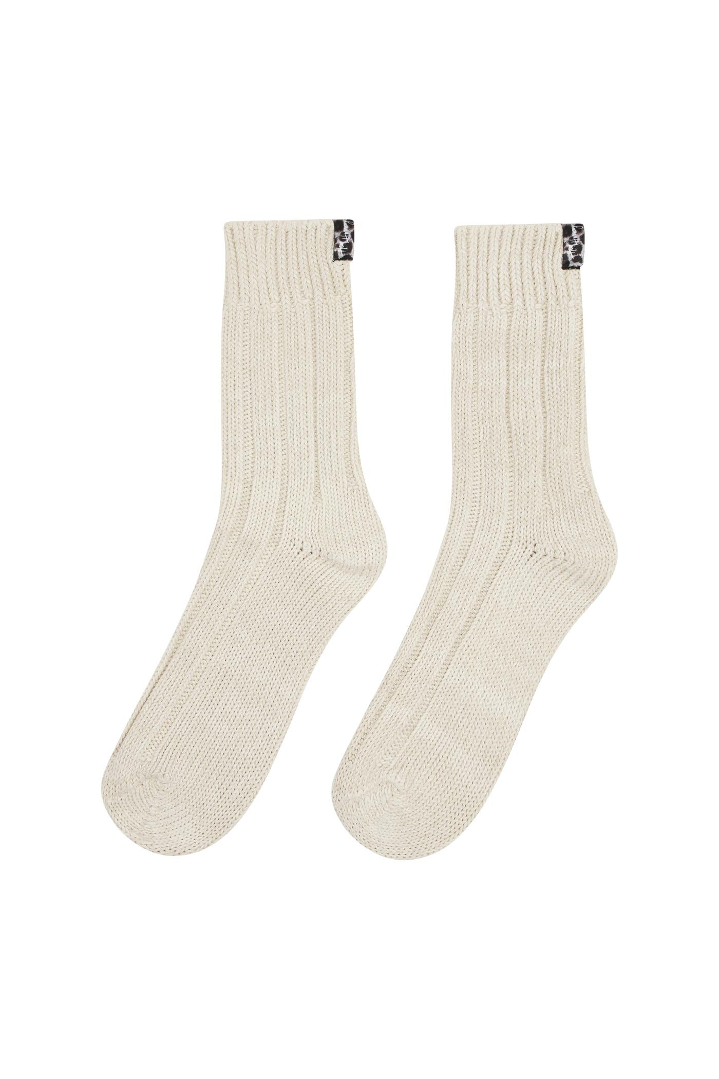 Hey Honey ribbed cream socks with black and white logo tags.